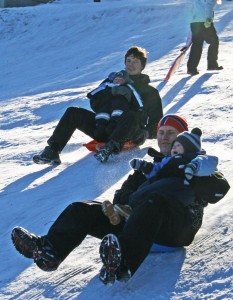 Kay, Magnus, dad and me on a sleigh.